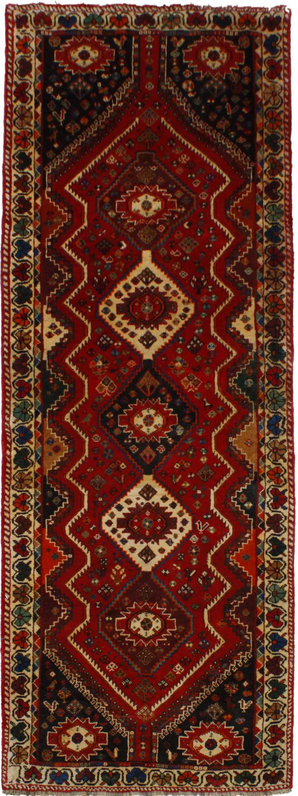 فرش دستباف شيراز ترکباف طرح ۵ ترنج سایز كناره۳٫۱۵×۱٫۱۶ رنگ زمینه لاكي رنگ حاشیه كرم کد ۴۲۳۱۴